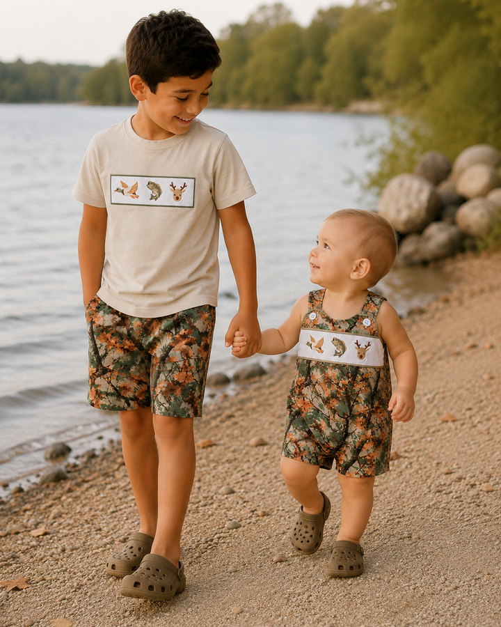 Siblings walking by the lake