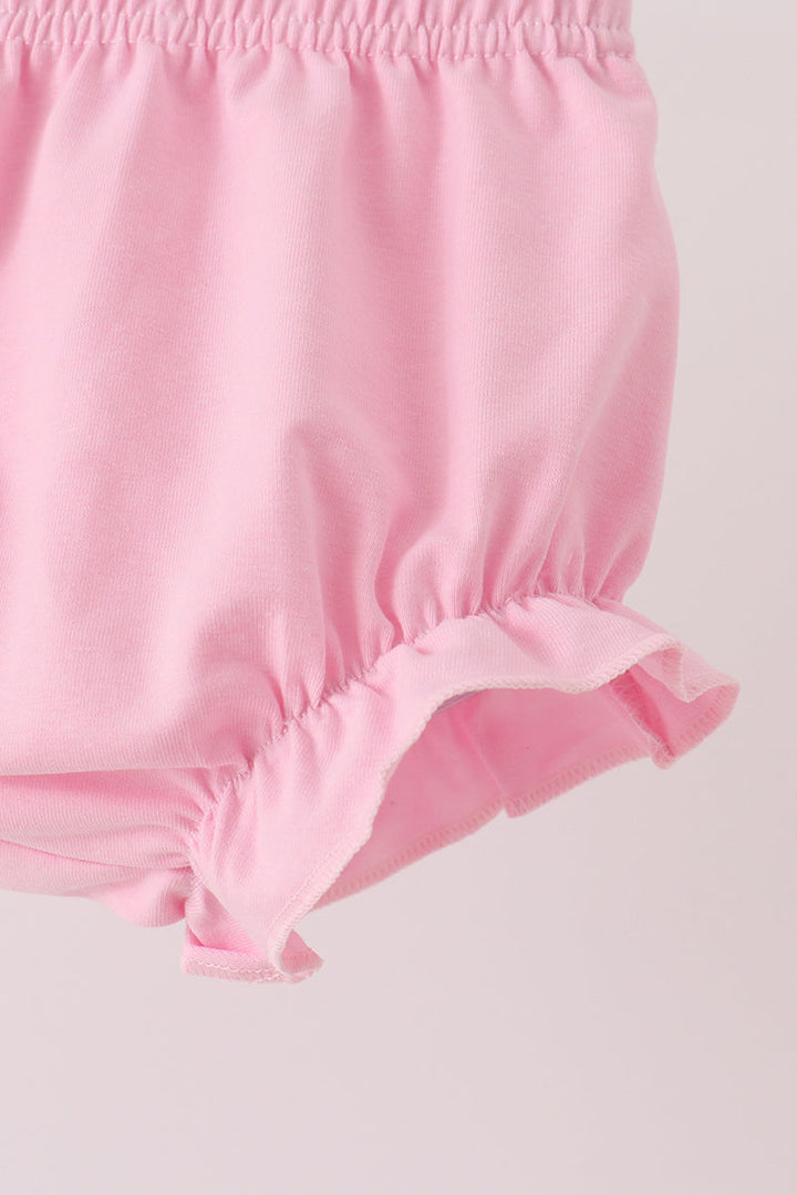 Pink bloomer shorts with elastic waistband and ruffled leg openings